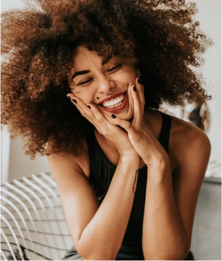 Confident patient smiling with bright healthy teeth after cosmetic dental treatment – LIV Dentistry