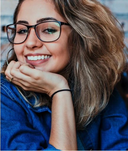 Confident patient smiling with bright healthy teeth after cosmetic dental treatment – LIV Dentistry