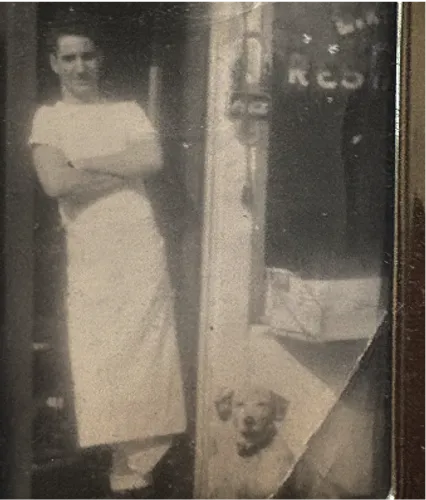 Vintage photo of a young Italian chef standing outside his restaurant, symbolizing the immigrant roots and family legacy that inspired Anna’s Vesuviano in Providence, Rhode Island